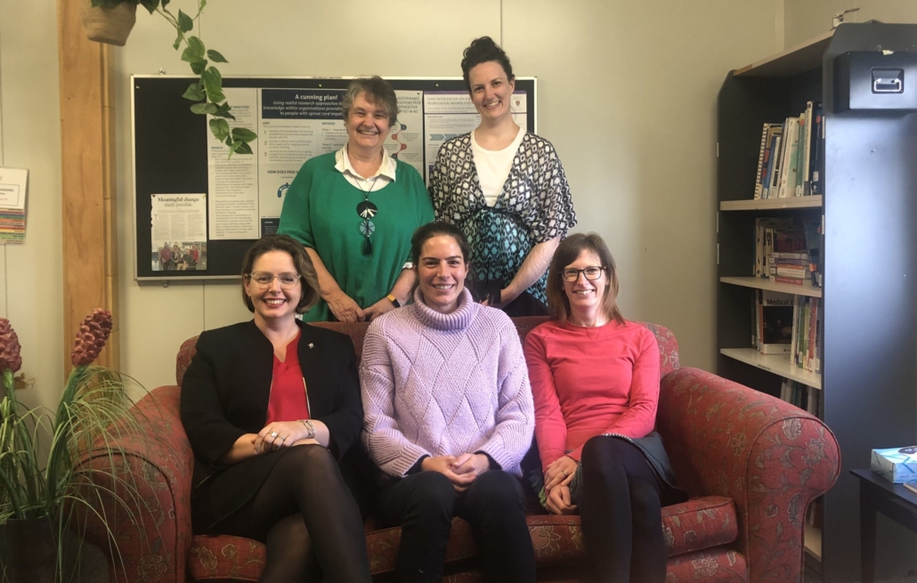 A photo of the Burwood Academy team. Five people are pictured in one of the research offices.